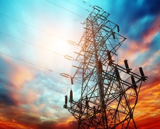 high voltage post at sunset