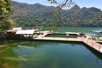 beautiful scenery at dayang bunting lake (tasik dayang bunting) in pulau langkawi, kedah malaysia. langkawi island (pulau langkawi) is one of the most visited places by tourists in malaysia. 