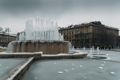 fountain in front of sforza castle, italian: castello sforzesco,