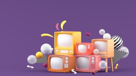 pink television among the colorful balls on the purple background.-3d render.