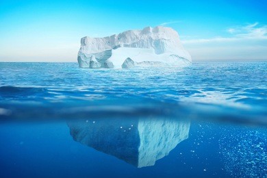 underwater view of iceberg with beautiful transparent sea. hidden danger and global warming concept 