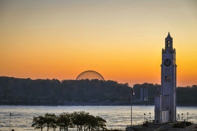 view of montreal clock dock at sunrise