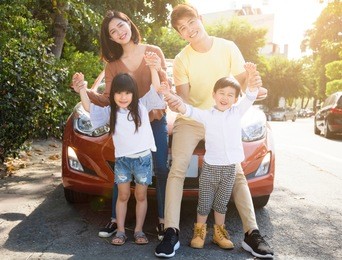 happy family enjoying road trip and summer vacation