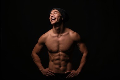 portrait of young asian boy with fitness body. positive attitude.