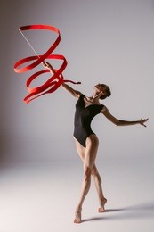 young gymnast woman stretching and training