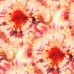 seamless tie-dye pattern of orange color on white silk. hand painting fabrics - nodular batik. shibori dyeing. 