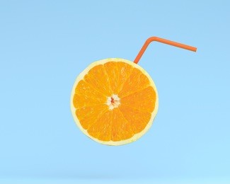 orange juice, lemon slice with straw on pastel blue background. minimal idea food and fruit concept. an idea creative to produce work within an advertising marketing communications.  business concepts