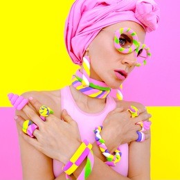 candy fashion look. girl in marshmallow accessory. pastel vanilla trend