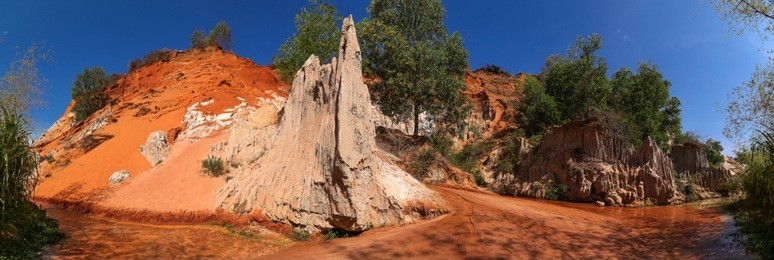 panoramic view. red dune and red sand pattern at fairy stream. mui ne, vietnam.