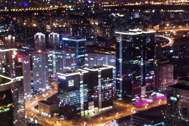 beijing. beijing's downtown image during the twilight blue hour. abstract city night lights defocused background