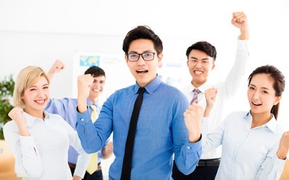 happy successful multiethnic business team