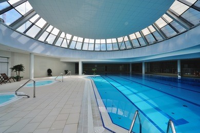 indoor swimming pool with jacuzzi on resort