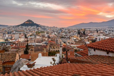 view of lycabettus hill from anafiotika neighborhood in the old town of athens, greece. 
