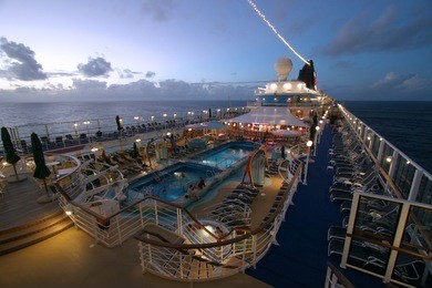 wide angle view of cruise ship deck after sunset.