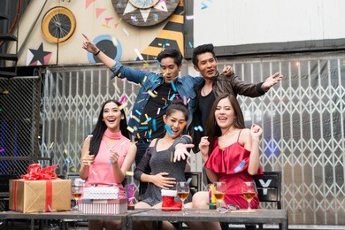 happy time, group of asia beautiful young people standing and celebrating together the party in the night club. birthday,  new year eve, corporate party, best friends