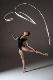 young gymnast woman stretching and training
