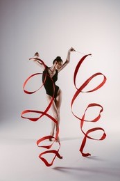 young gymnast woman stretching and training