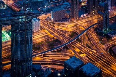 complex highway interchange on dubai highway at night
