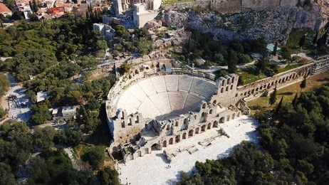 aerial drone bird's eye view photo from iconic ancient theater of herodus atticus near acropolis hill, athens historic center, attica, greece