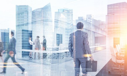 many business people walking, talking and going to their workplace in a modern city. toned image double exposure mock up