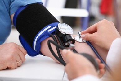 female doctor arms make medic procedure closeup. physical cure arterial beat exam tool nurse control and consult healthy lifestyle diagnosis therapeutist practice heal problem reception concept