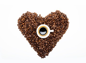  roasted coffee beans heart shape on white background. love coffee. coffee break. coffee time.