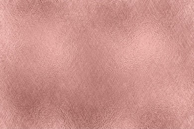 abstract metallic background. rose gold foil texture.