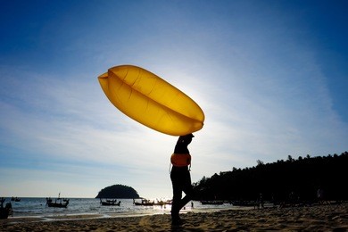 yellow air sofa for rent at kata beach, phuket island, thailand.