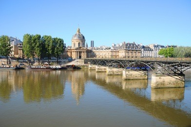 the pont des arts or passerelle des arts is a pedestrian bridge in paris which crosses the institut de france.with institut de france in background