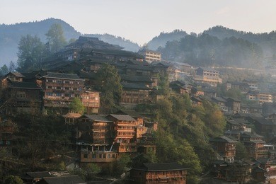 xijiang qianhu miao village in guizhou, china at sunrise