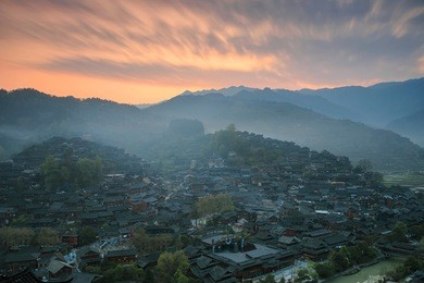 xijiang qianhu miao village in guizhou, china at sunrise