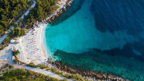 aerial view of marble beach. the most beautiful white beach in greece