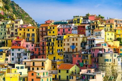 colorful houses in manarola village, cinque terre coast of italy. manarola is a beautiful small town in the province of la spezia, liguria, north of italy and one of the five cinque terre attractions.
