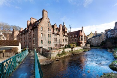historic houses along leith river in dean village in edinburg