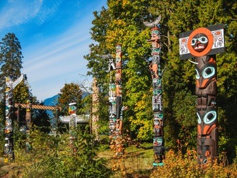 colorful indian totems in stanley park vancouver canada