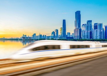 high speed train in urban background, guangzhou, china.