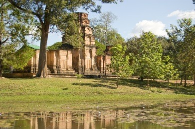 view across the moat of the ancient khmer temple of prasat kravan.  part of the angkor complex. cambodia. ancient temple, hundreds of years old.