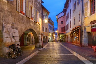 nice street in old town of annecy at rainy night, france