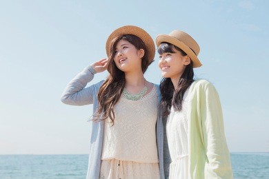japanese girls play on the beach