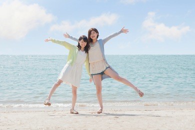 japanese girls play on the beach