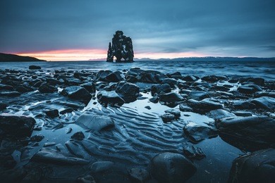 wonderful dark sand after the tide. location place famous hvitserkur, vatnsnes peninsula, iceland, europe. amazing scene. scenic image of beautiful nature landscape. discover the world of beauty.