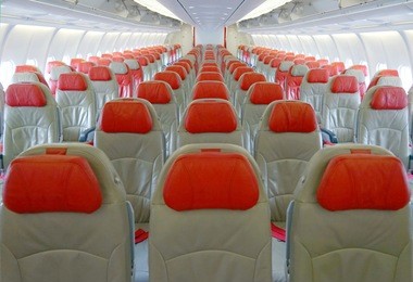 empty passenger airplane seats in the cabin