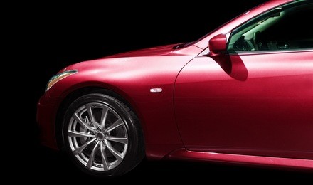 car on a black background