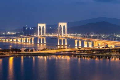 sai van bridge at night in macau, china