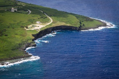 aerial view of the northern tip of saipan island in the pacific ocean. banzai cliff.