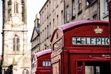 red telephone boxes on royal mile, edinburgh, scotland
