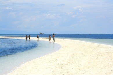 tourist on the virgin island of bohol, pontod, panglao, the philippines 