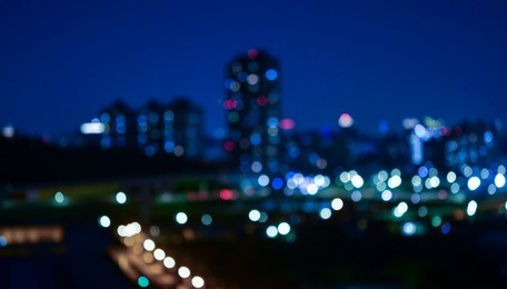 night bokeh light in big city, abstract blur defocused background.