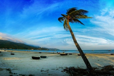 da nang, vietnam: my khe beach at sunset which is one of the most beautiful beach of the world.