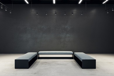 contemporary exhibition hall with copy space on wall and bench. gallery, art, exhibit and museum concept. mock up, 3d rendering 